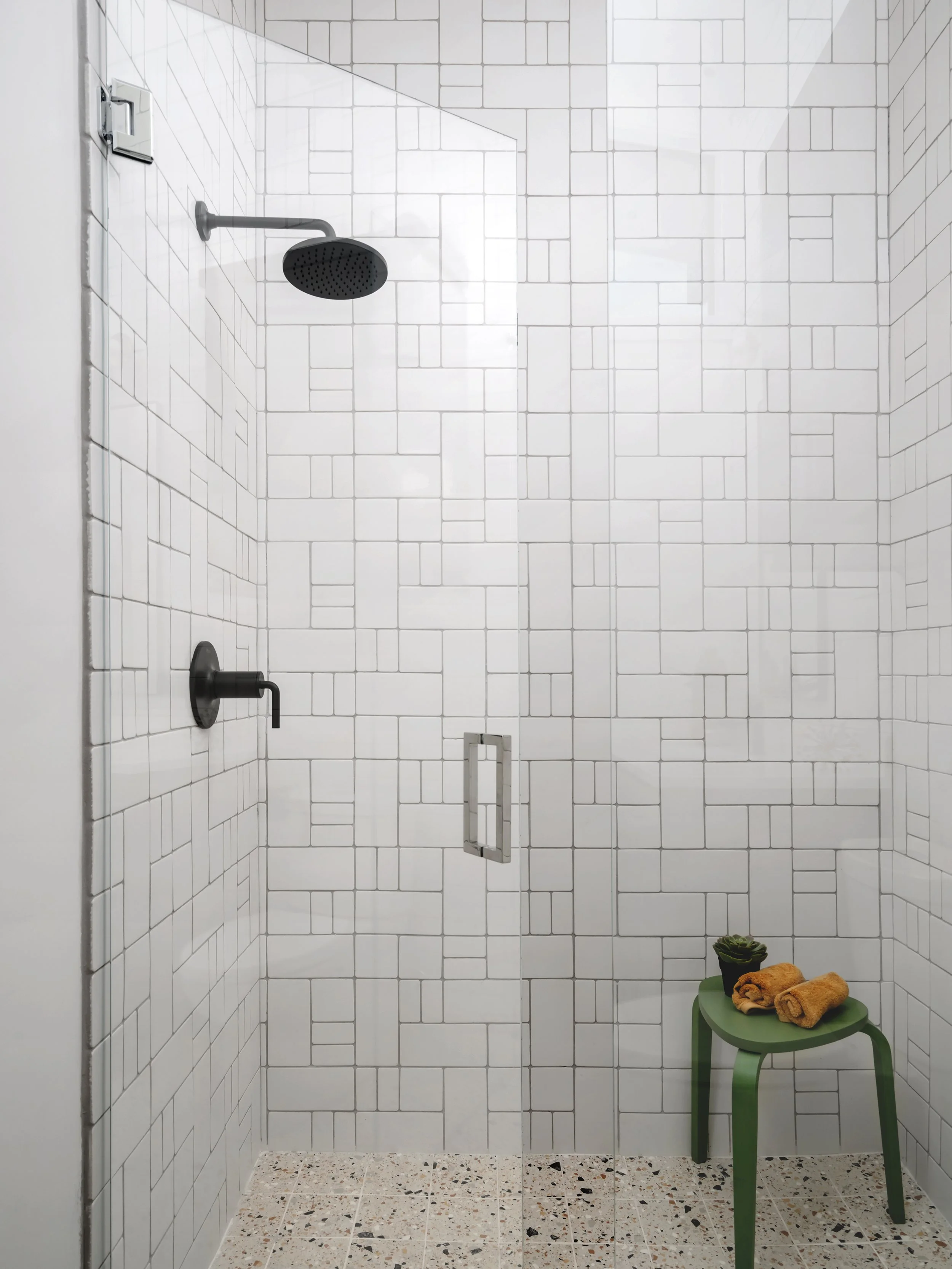 White tile shower with matte black fixtures, Breathe Design Studio