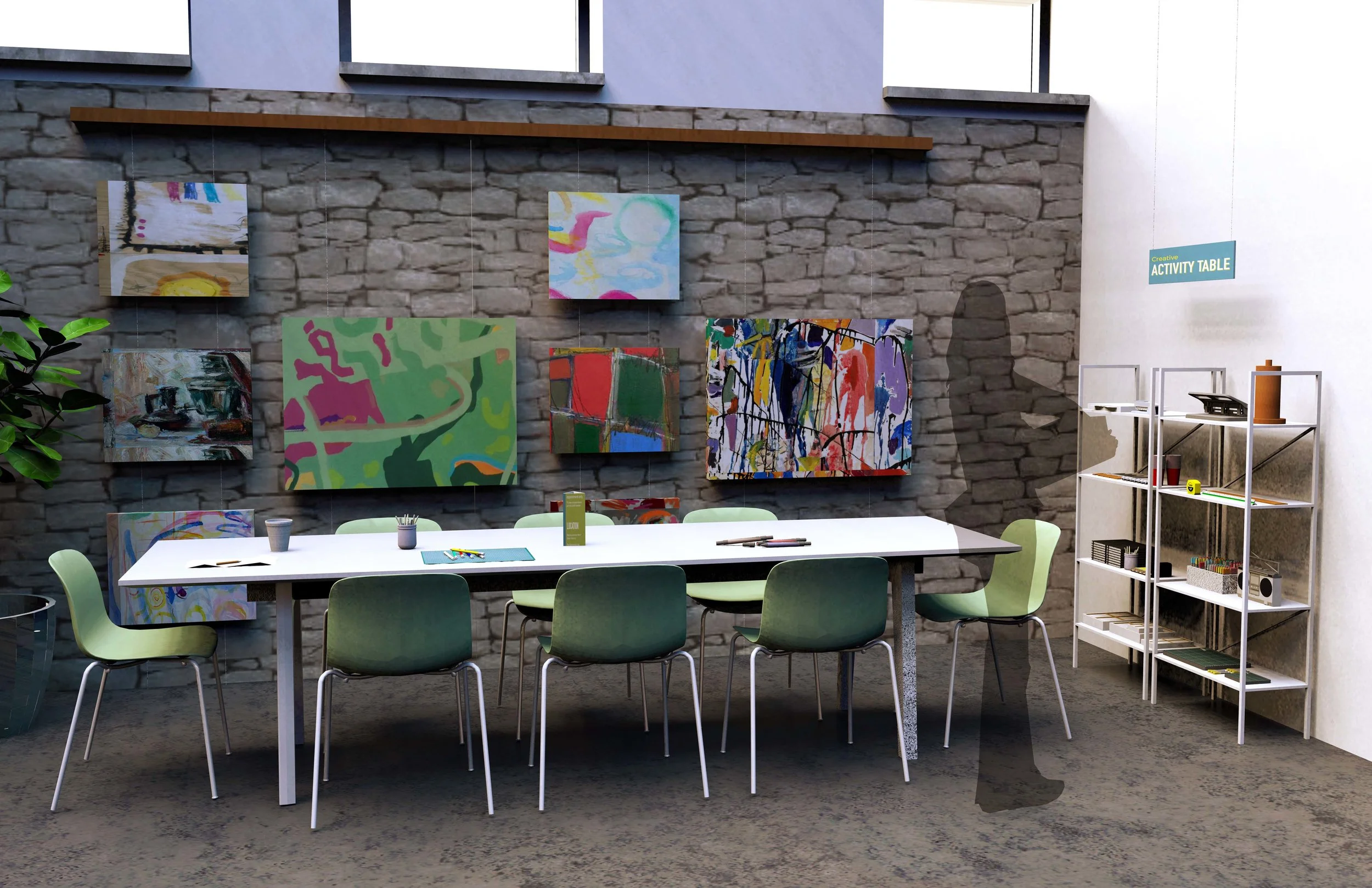  The art activity table consists of a hanging art wall so that residents may display their creations. A large work table offers a place for crafts, meetings and messy work. 