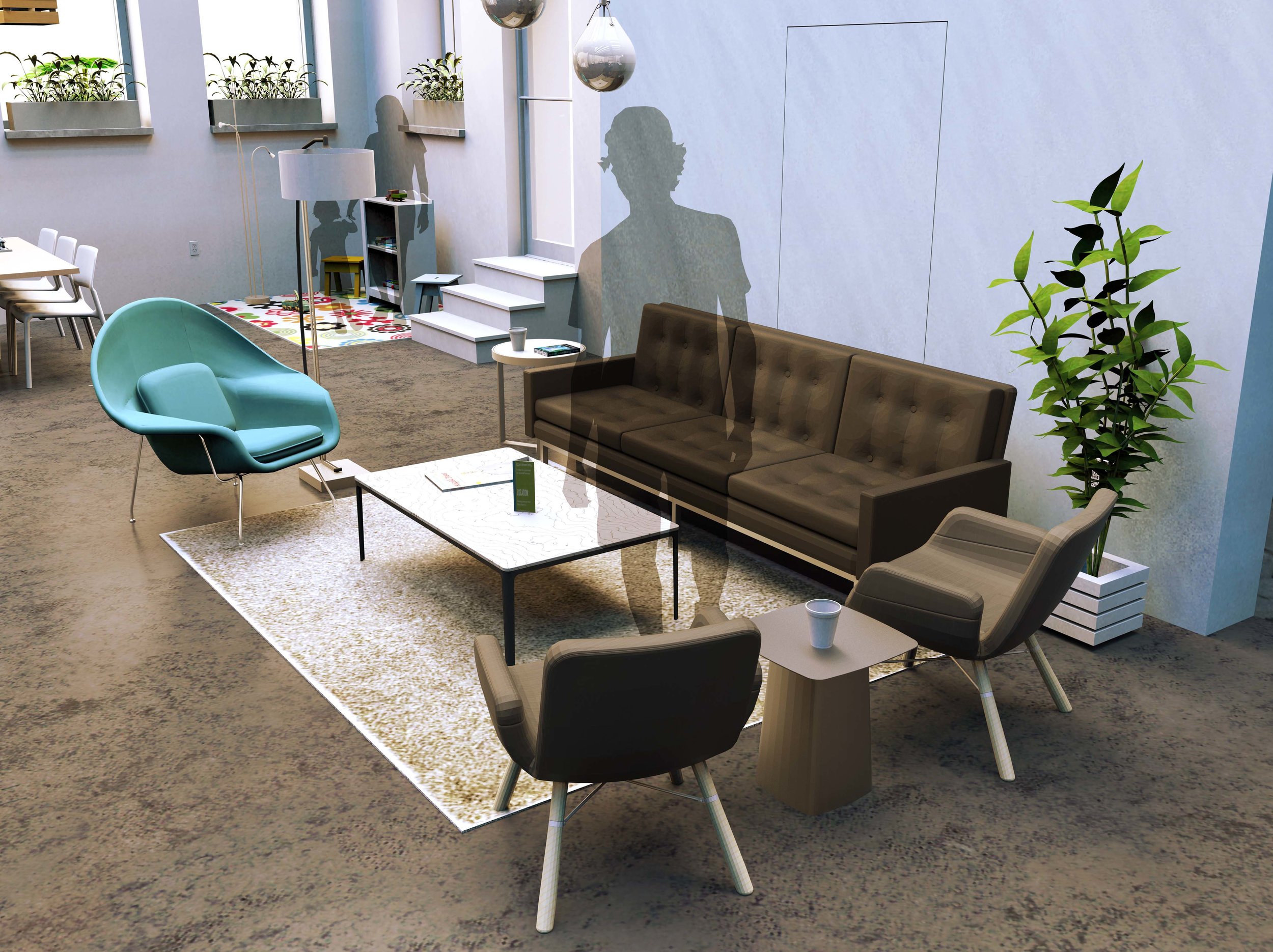  In the center of the room, a lounge area provides a welcoming space for informal gathering, meetings and conversation. Residents may take their coffee here to relax and watch their children. 