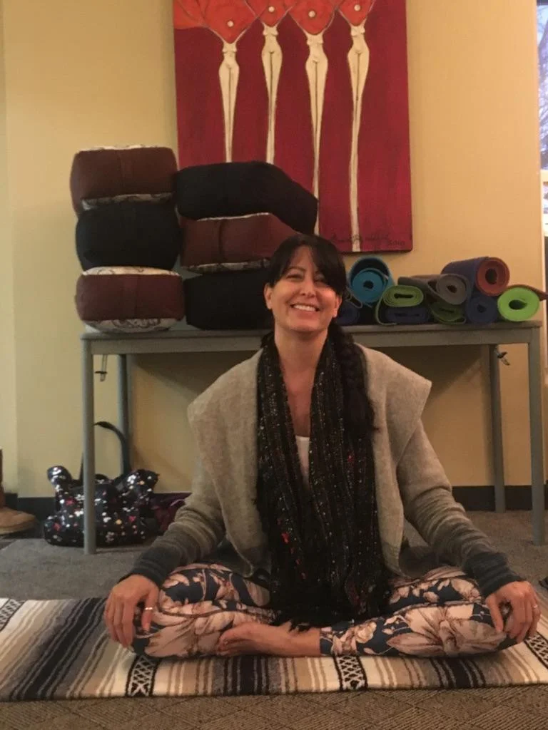 Pictured: Juanita facilitating our monthly English Yoga workshop.