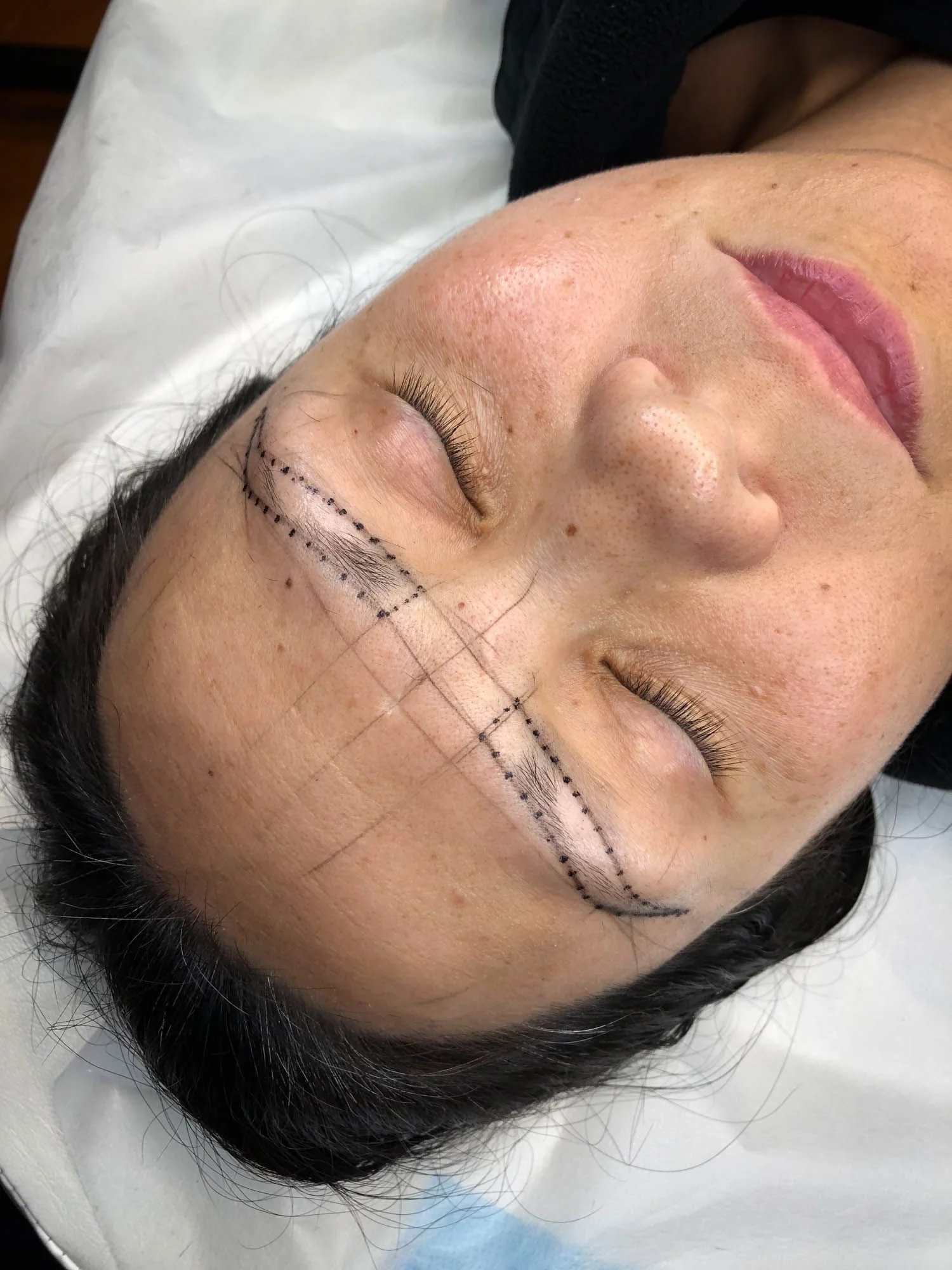 Eyebrow microblading mapping for even brows