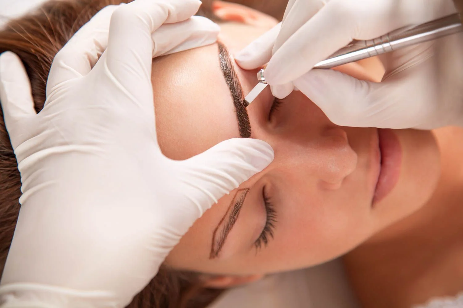 Process of applying microblading strokes to mimic hair