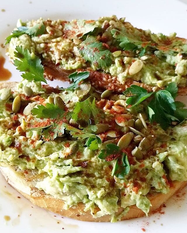 What is it about avocado toast that makes it so damn delicious? 
Is it the crispy, chewy bread it's donned on top of, or the creamy, decadent texture of the avocado? 
The salty, spicy combination of chili flakes and sea salt, or the cheesy pop you ge