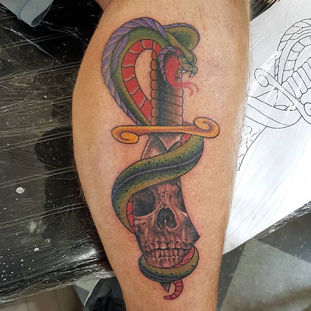 One of my scribble drawings made into a #tattoo that I had fun making. Love my job #heavydutytattoo #ogden #utahtattoos #brandonlewismachines #utah #legtattoo #snakeanddagger #ogdentattoos #skulltattoo #snaketattoo #daggertattoo #traditionaltattoo #r