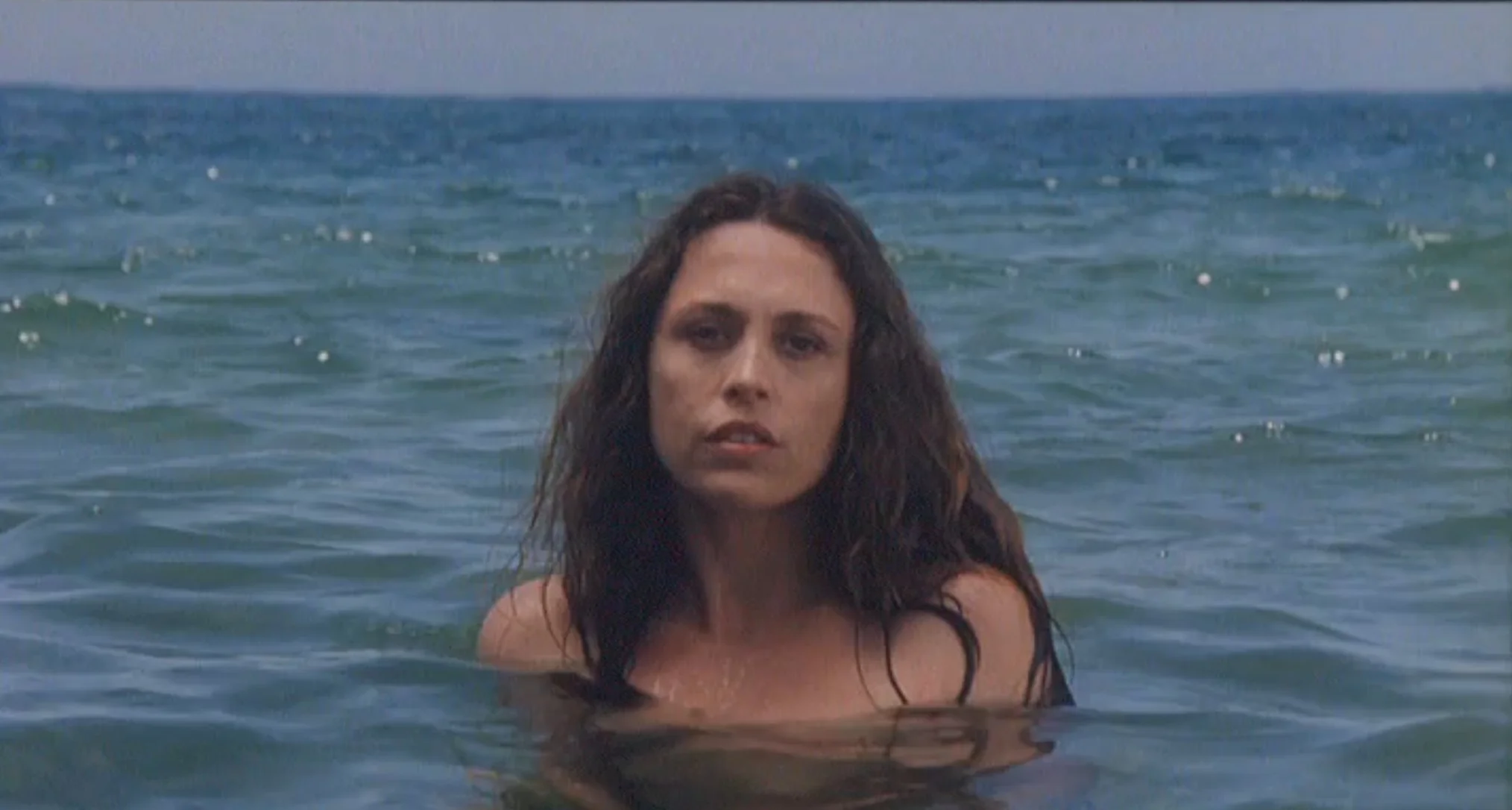 Suzanne Howard as the WOMAN
