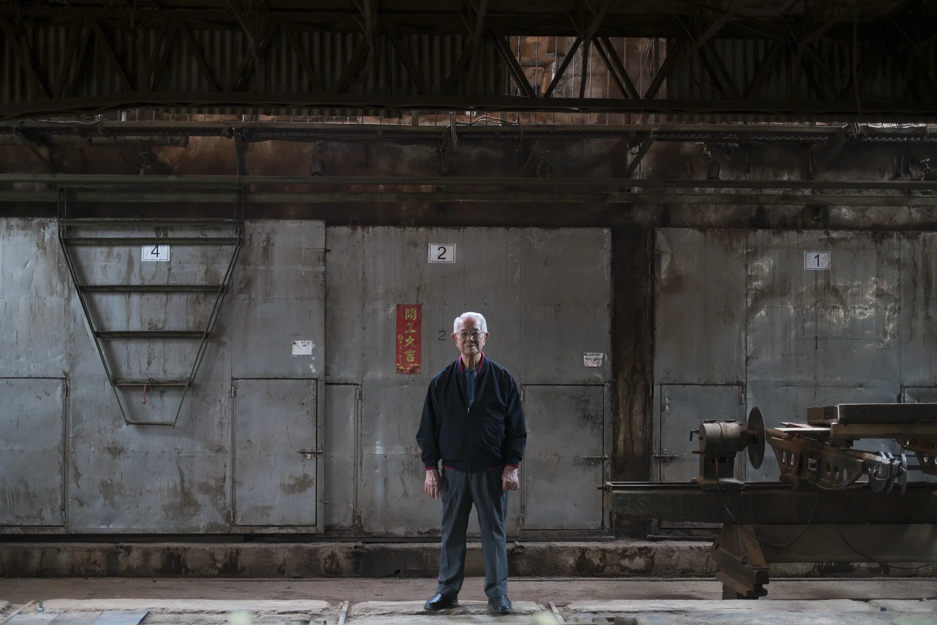Li Shun-Yi the president of a timber mill 李順益