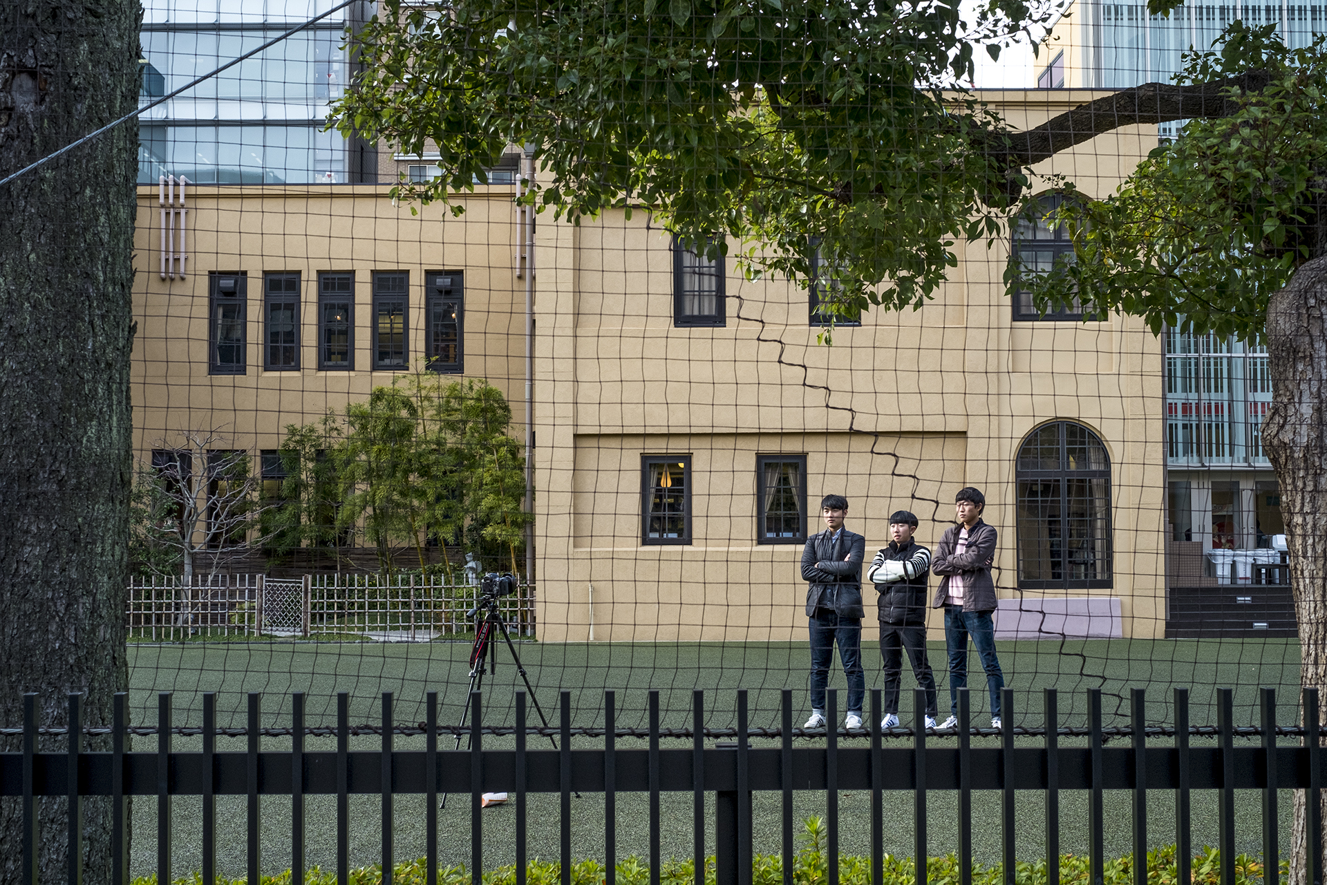 Three Korean boys take a selfie at Kyoto International Manga Museum, Kyoto, Japan