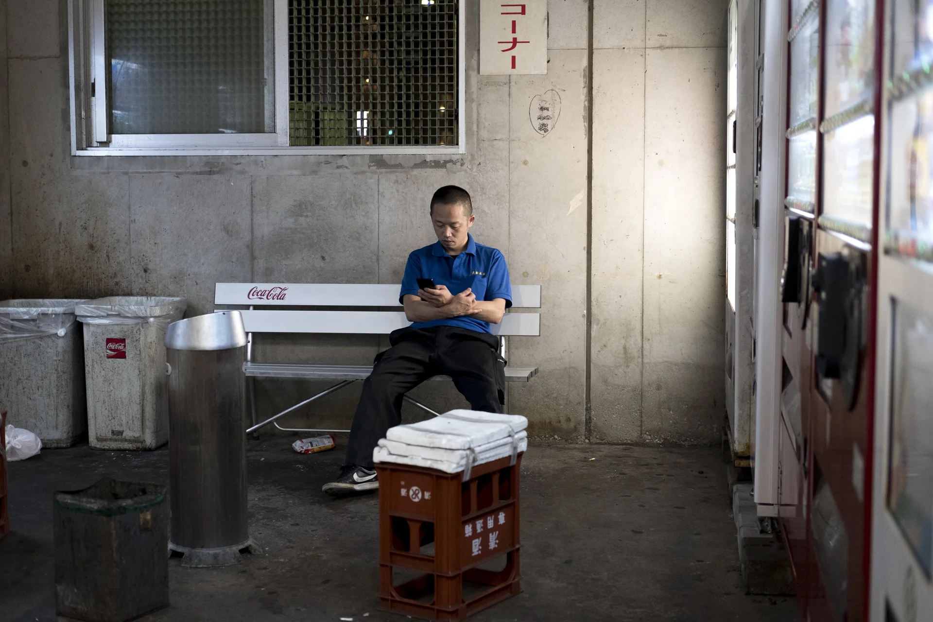 A staff of a fish company takes his break time for a while at 4 AM, Fukuoka, Japan