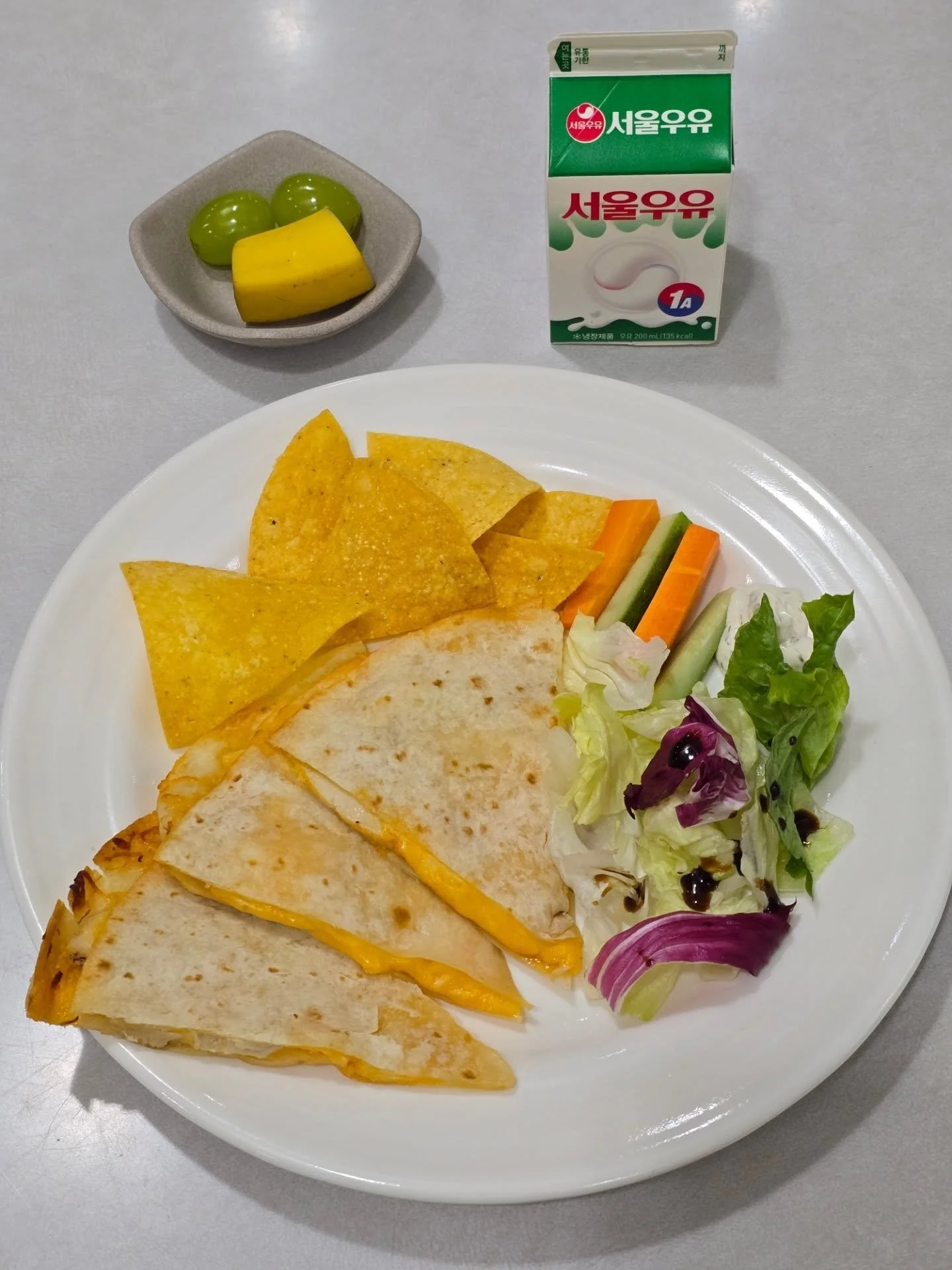 2026.03.24
International
Chicken Quesadillas
Veggie Sticks &amp; Ranch Dip
Mixed Green Salad 
Corn Tortilla Chips
Fruit
Milk

Korean
Stir- Fried Pork - 돼지고기 야채 소금 구이 
Millet Rice - 기장밥 
Miso Soup - 미소 된장국 
Crab Meat Pancake - 게맛살전
Mung Bean Sprout - 