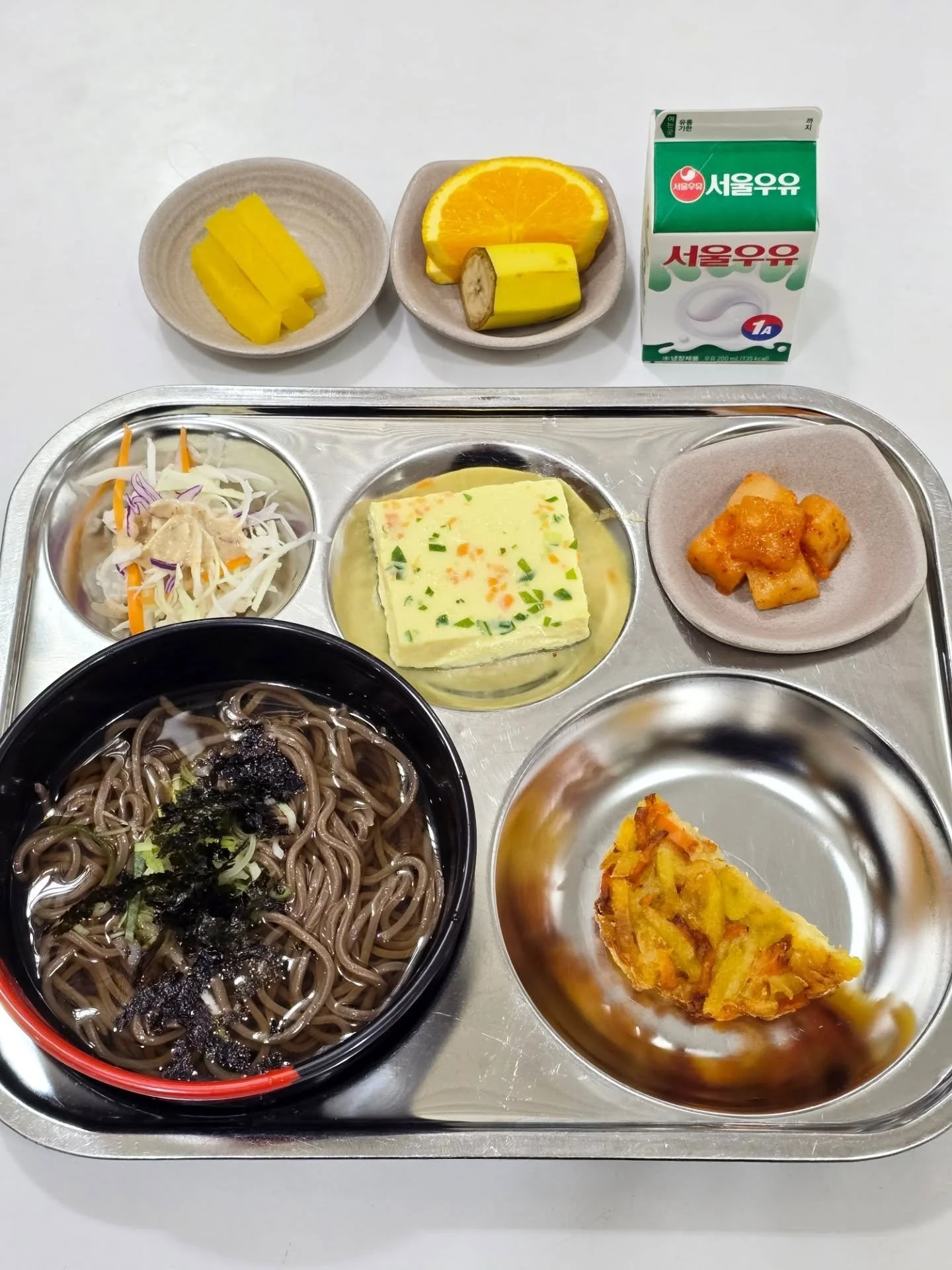 2026.06.11
Korean
Cold Buckwheat Noodles w/ Vegetable Tempura - 냉모밀국수와 야채 튀김 
Steamed Eggs - 계란찜 
Cabbage Salad - 양배추 샐러드
Cubed Radish Kimchi &amp; Pickled Radish- 깍두기/단무지
Fruit
Milk

International
BBQ Roasted Chicken
Roasted Potatoes
Veggie Sticks w