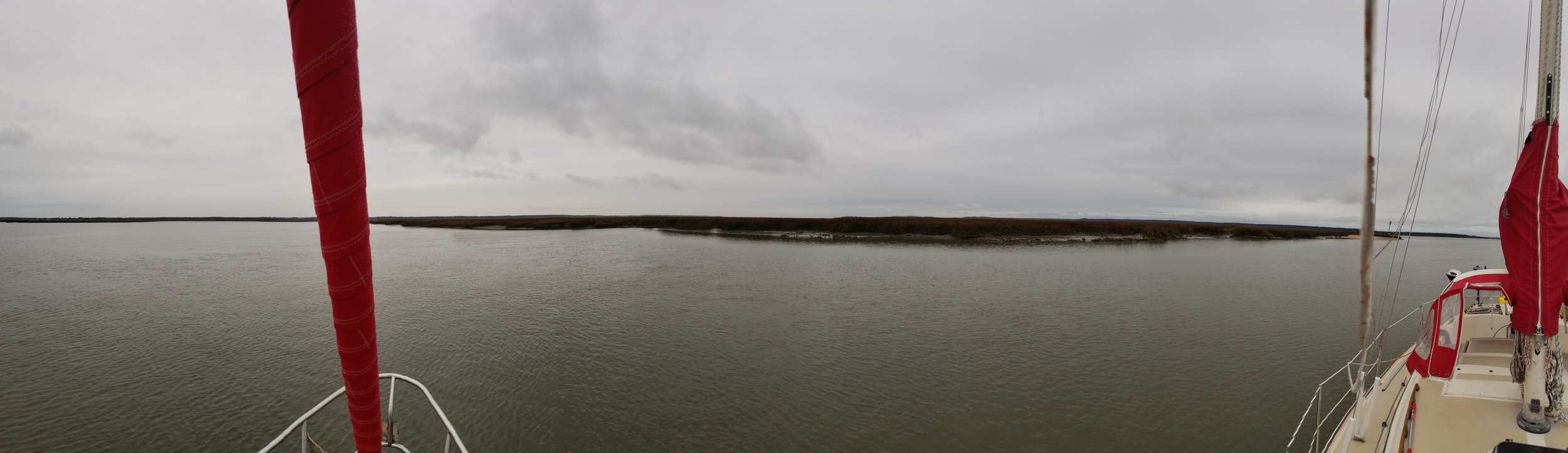 Anchored in the Bear River surrounded by marshland without any signs of civilization.
