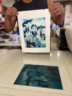Bucky Harzo with his photopolymer photogravure plate and print.jpg
