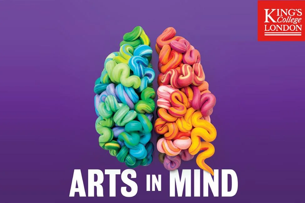 "Arts in Mind" written in white on a purple background, with a 'brain' modelled in soft coloured clay.
