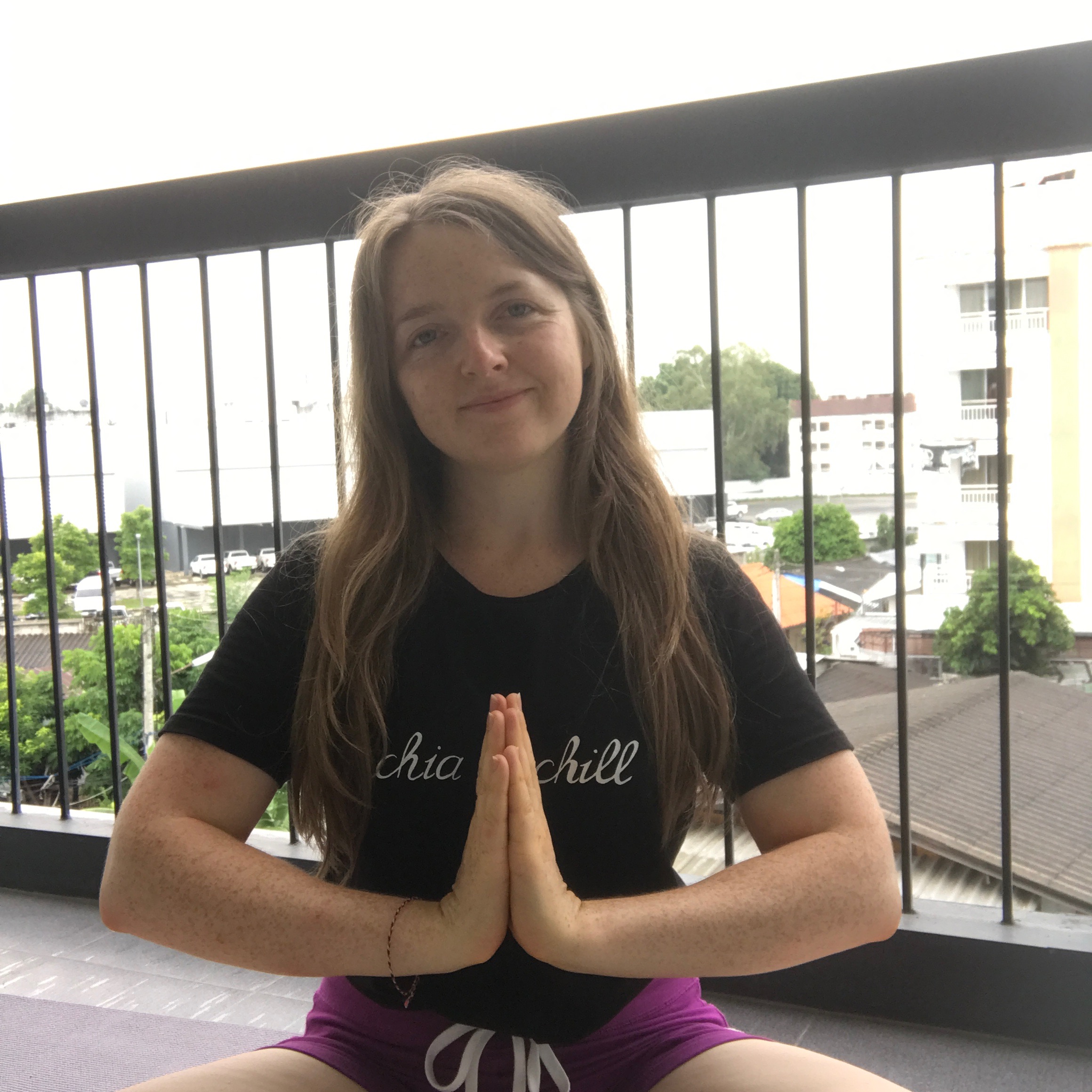 Me, on a balcony in Chiang Mai, living by the words on my tee, fresh from a yoga practice ✌