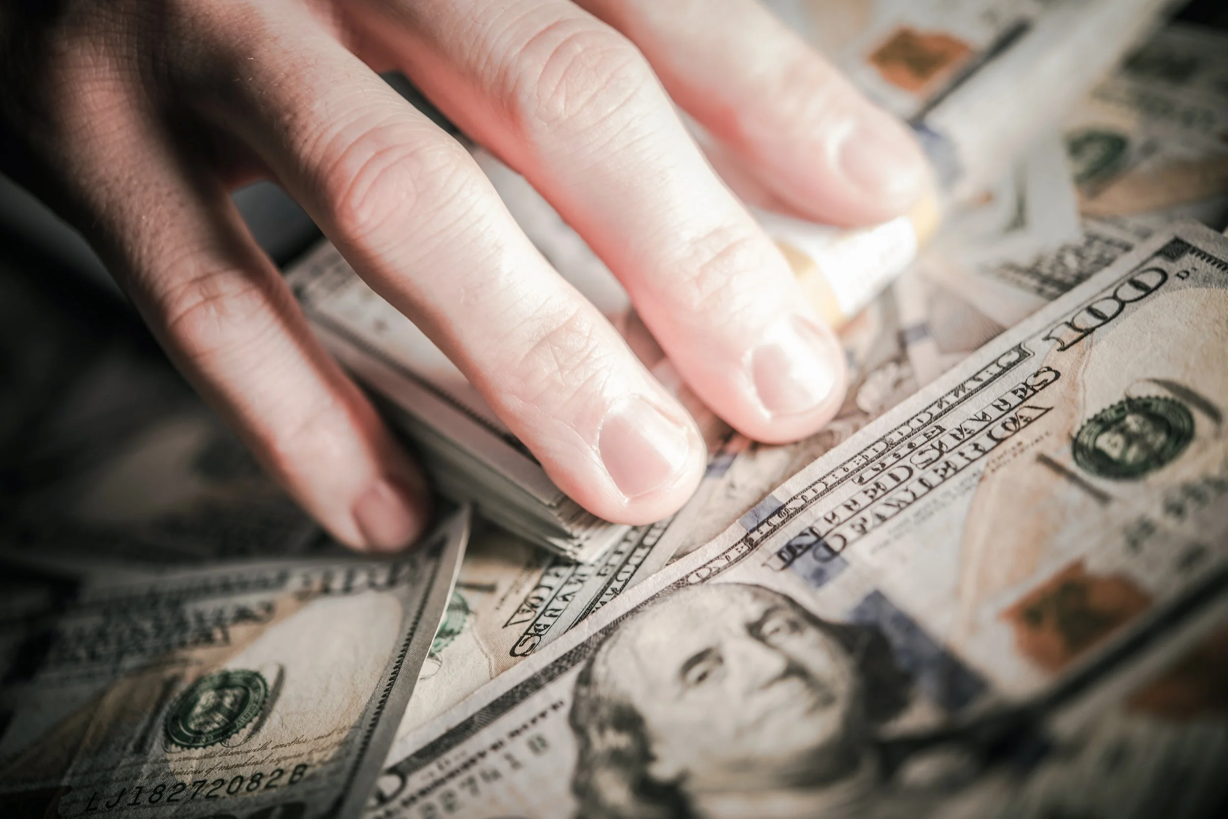hands-on-the-money-PPZ7NAJ.jpg