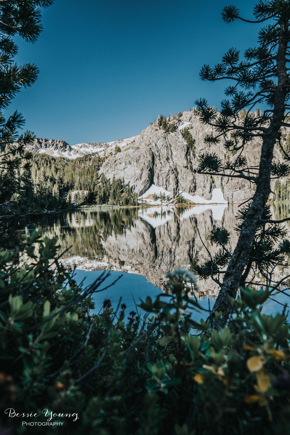 Ansel Adams Wilderness Backpacking. This is Rosalie Lake along the John Muir Trail. Landscape Photograph of a High Mountain lake photographed by Bessie Young