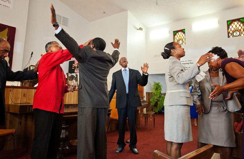  Pastor Dan Thompson leads worship at the Morning Star Church of God in Christ in Oxnard, California. 