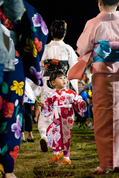  A young girl participates in her first Bon Odori, or Bon Dance, at the Makawao Hongwanji Mission in Makawao, Hawaii. Bon Dances are performed during Japanese Obon Festivals to welcome and honor the spirits of deceased family members. 