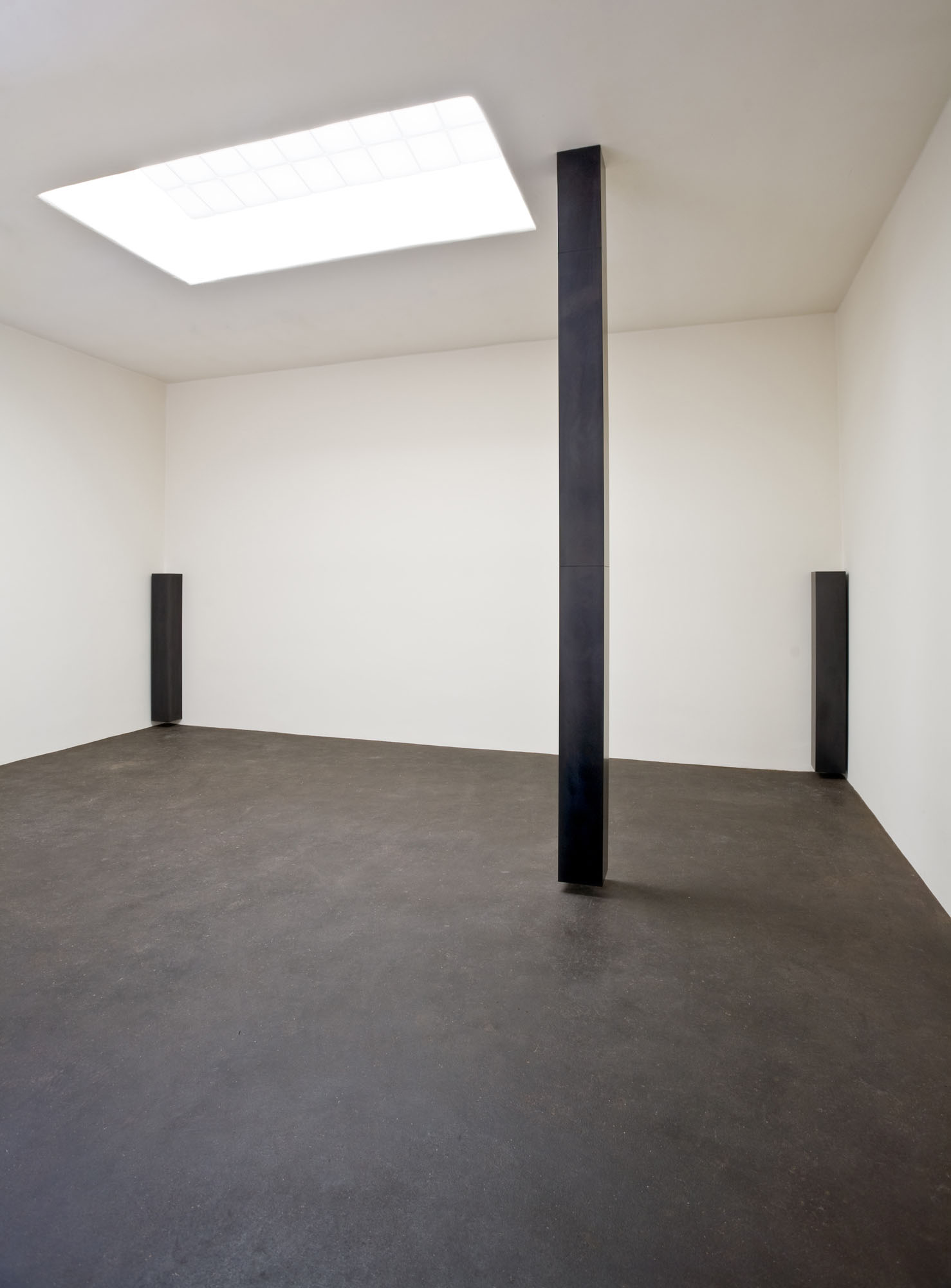   Three Columns (installation view, Lannan Foundation, 2008) Photo: Jamey Stillings  Corner Columns, Solid Graphite,&nbsp;72” x 10” x 10” x 9.5”  Floating Column, Solid Graphite,&nbsp;168" x 10"&nbsp;x 10"&nbsp;x 9.5"    