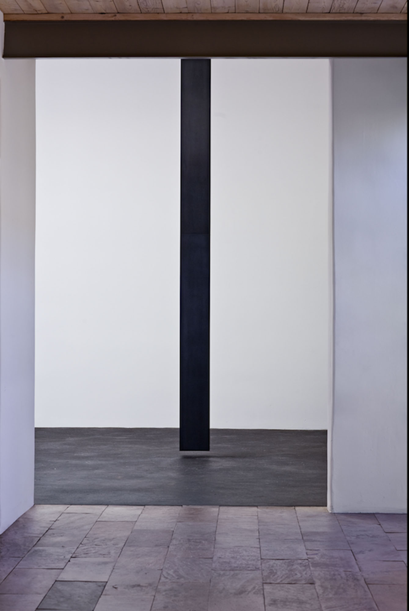   Floating Column, 2008  Solid graphite, 14’ x 10” x 10” x 9.5”  Lannan Foundation collection. Photo: Jamey Stillings 