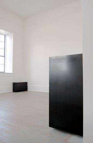  2d Exhibitions, 2015 (installation view)   Double Golden Mean Rectilinear Solid, 2007 (foreground)  Solid graphite,&nbsp;16" x 25.75" x 9.75" 