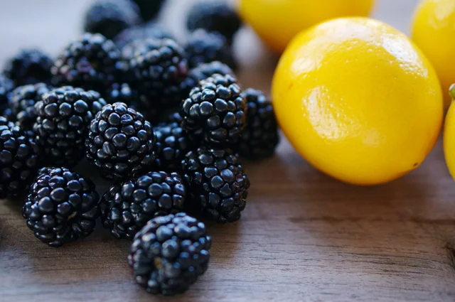 Lemon Mezcal Cheesecake with Blackberry Molasses topping