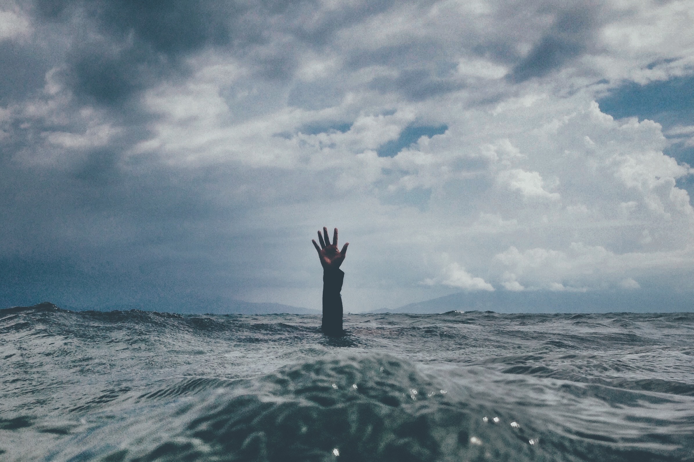 Arm reaching out from the sea
