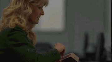 Animated GIF of a woman in an office setting fire with gasoline