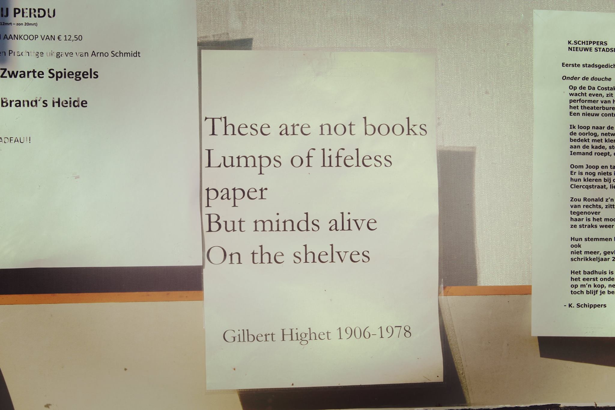 Note on the window of a cafe and poetry meetup space in Amsterdam.