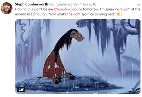 Screenshot from a tweet by Stephanie (@S_Cumberworth) which says ‘ Hoping this won’t be me @SoapboxScience tomorrow. I’m speaking 1-2pm at the mound in Edinburgh! Now what’s the right sacrifice to bring back ‘ sun emoji’?’ There is a still of a gif which is taken from the movie ‘The Emperors New Groove’ - it shows a llama sat crying on top of a rock in the jungle in the rain.