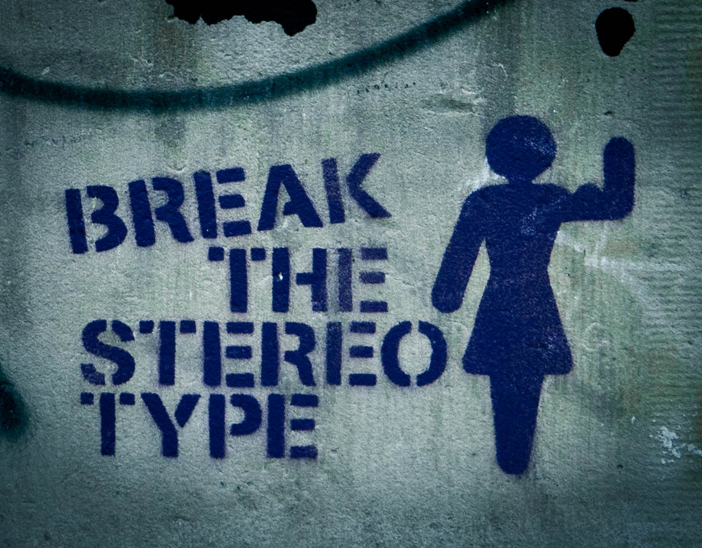 Graffitti of a women icon saying ‘Break the stereotype’