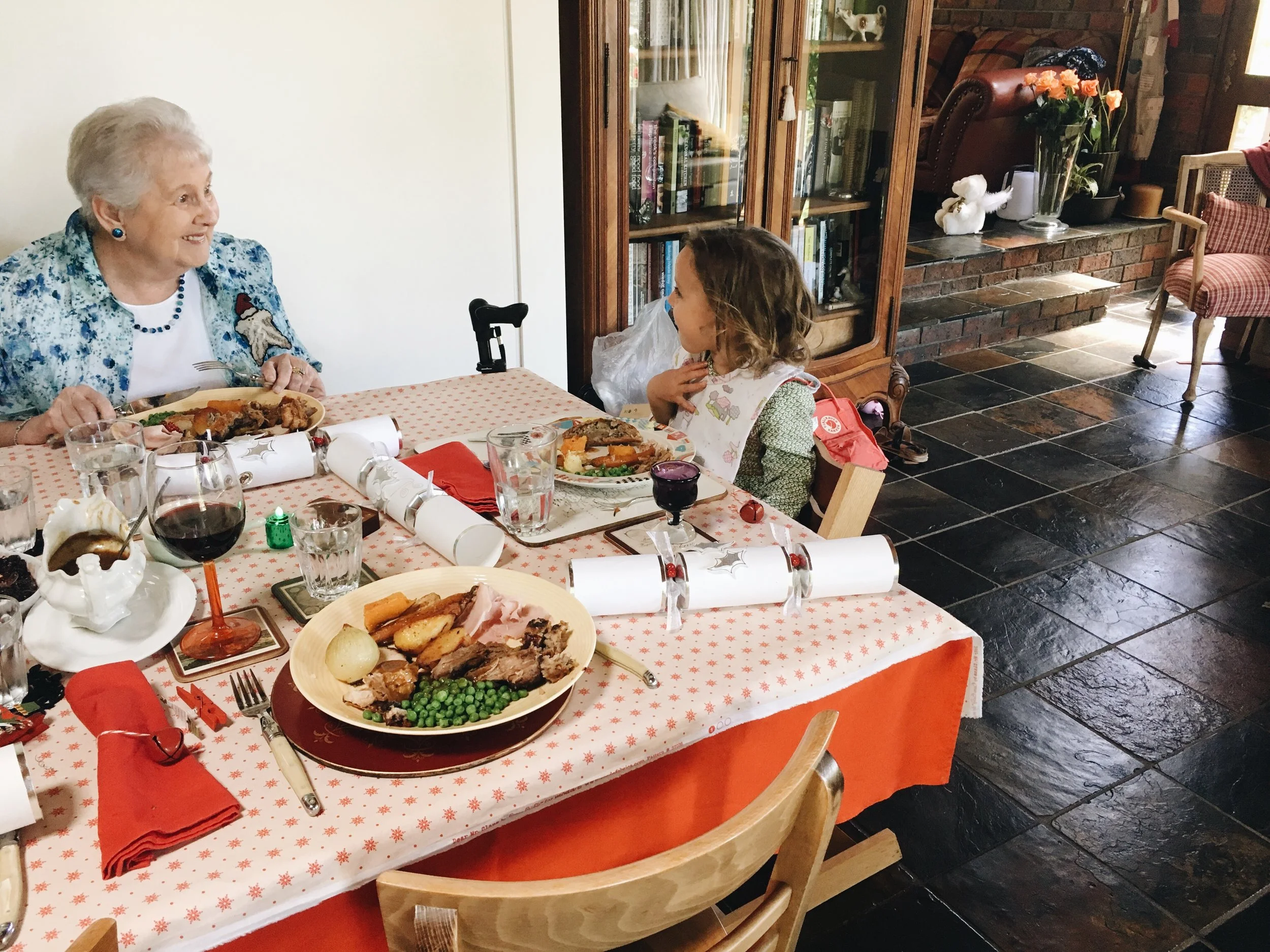 Joan chatting with her Great Grandmother. Note the little goblet Mum bought her so she'd feel like a grown up.