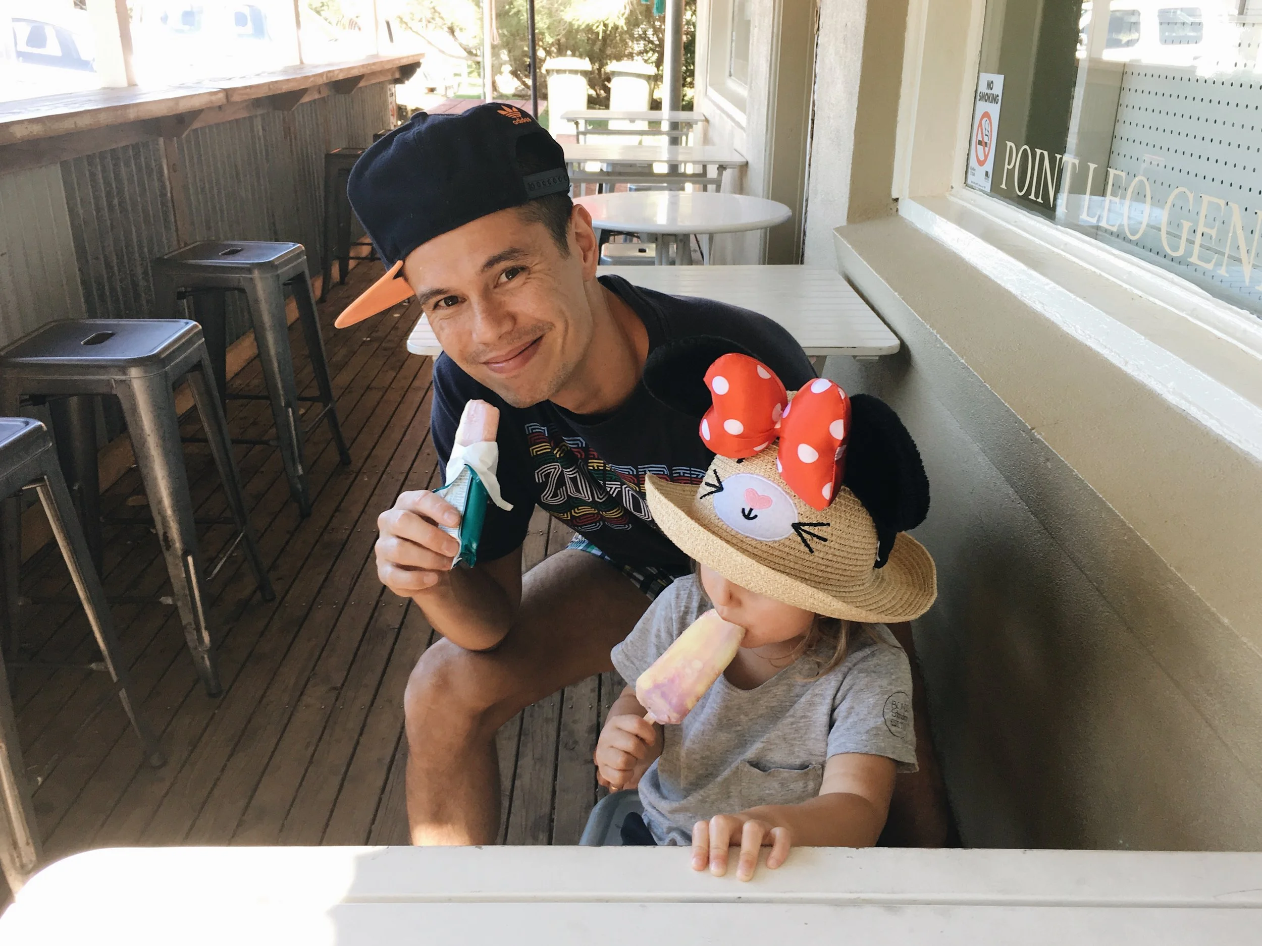 Icecream break. Note the Minnie ears OVER the hat. Joan's idea.
