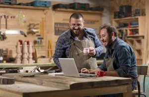 s300_Two_woodwork_designers_in_their_workshop_via_Fh_Photo_at_Shutterstock.jpg