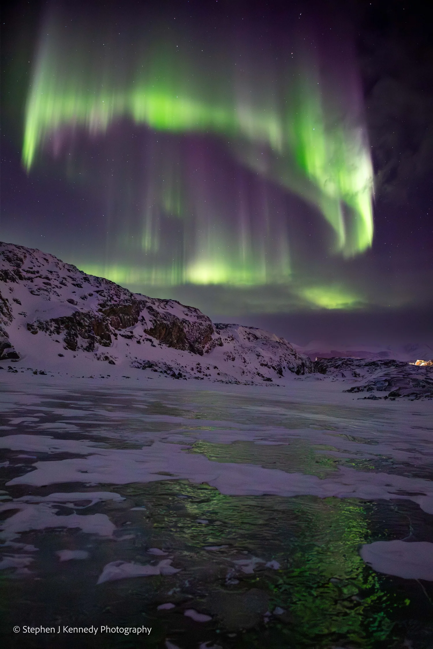 Uummannaq — aurora reflections on the lake