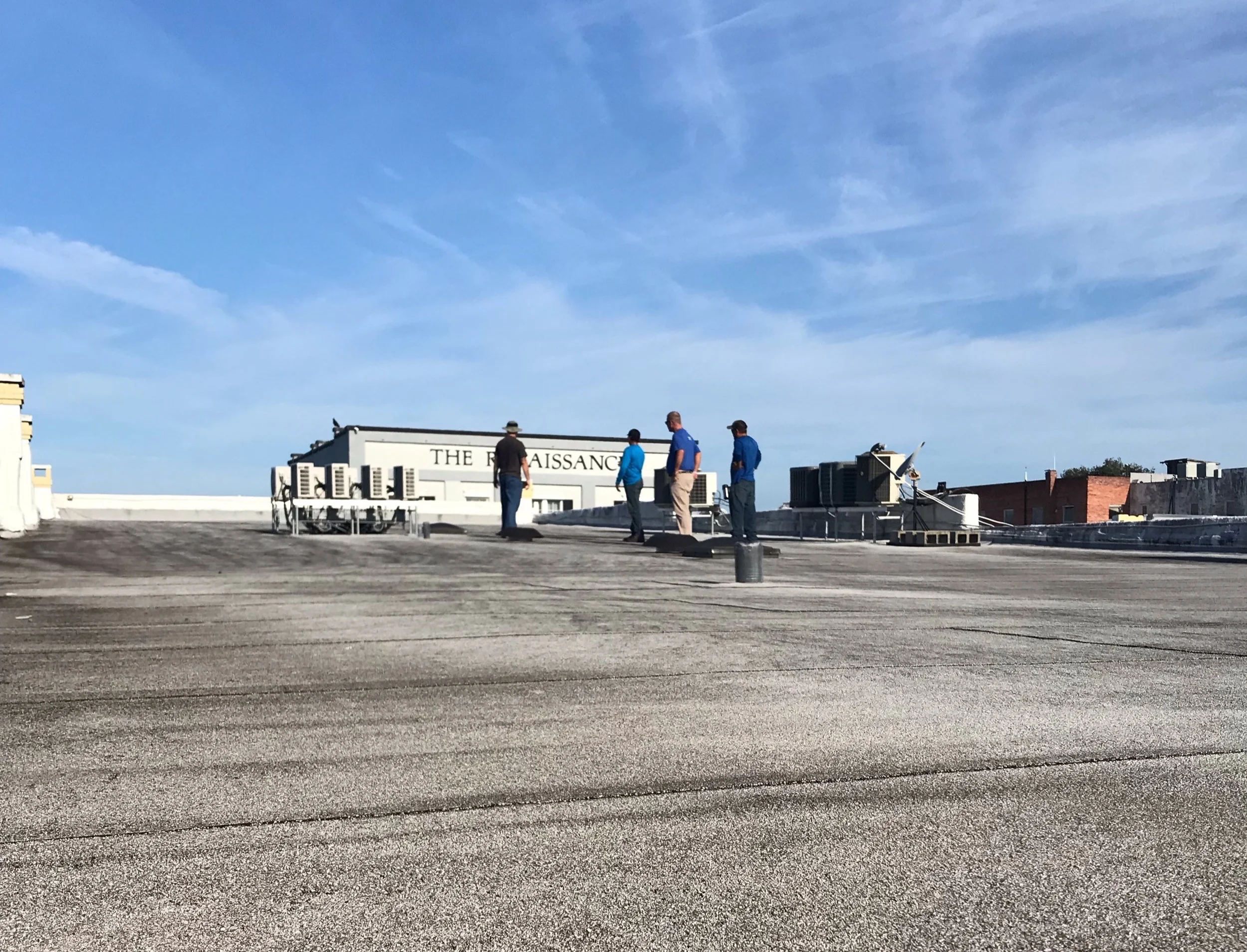 Surveying the roof at 402 Donnelly