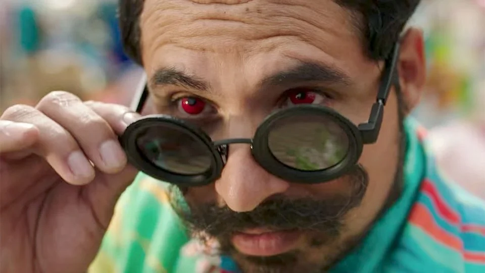 The man with red eyes--in beach attire!