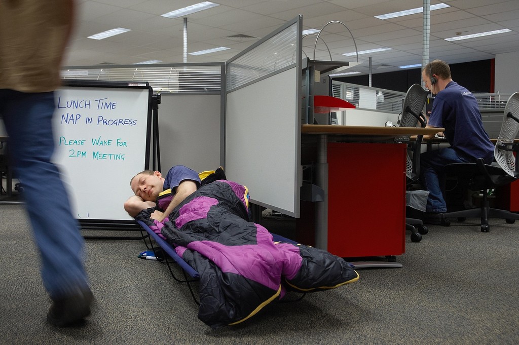 man napping on cot