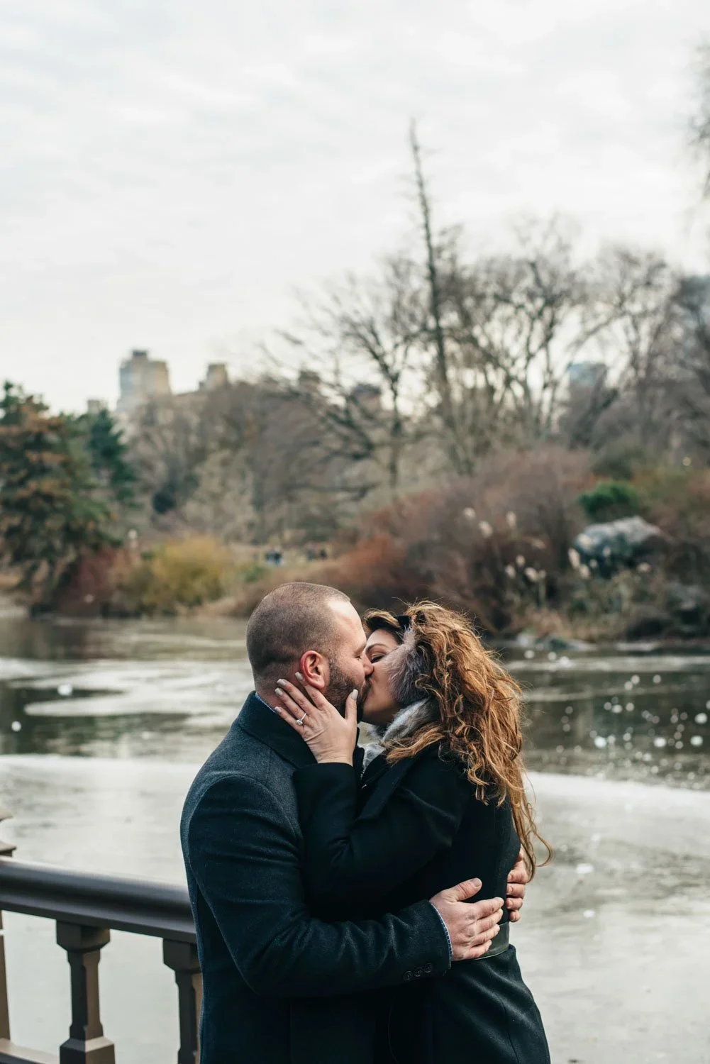 central-park-engagement-session-kissing-lakeview.jpg.webp