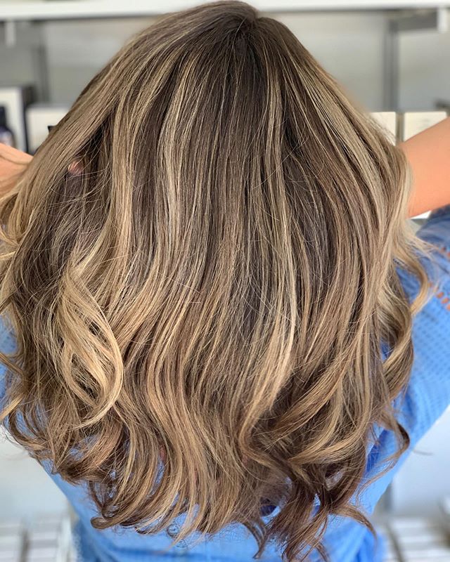 Wintery blonde. It&rsquo;s a million different shades with a million different possibilities. Leah&rsquo;s subdued blonde has a golden beige base, with a cool violet glaze on top to increase depth and create a neutral finish. #goldwell #goldwellblond