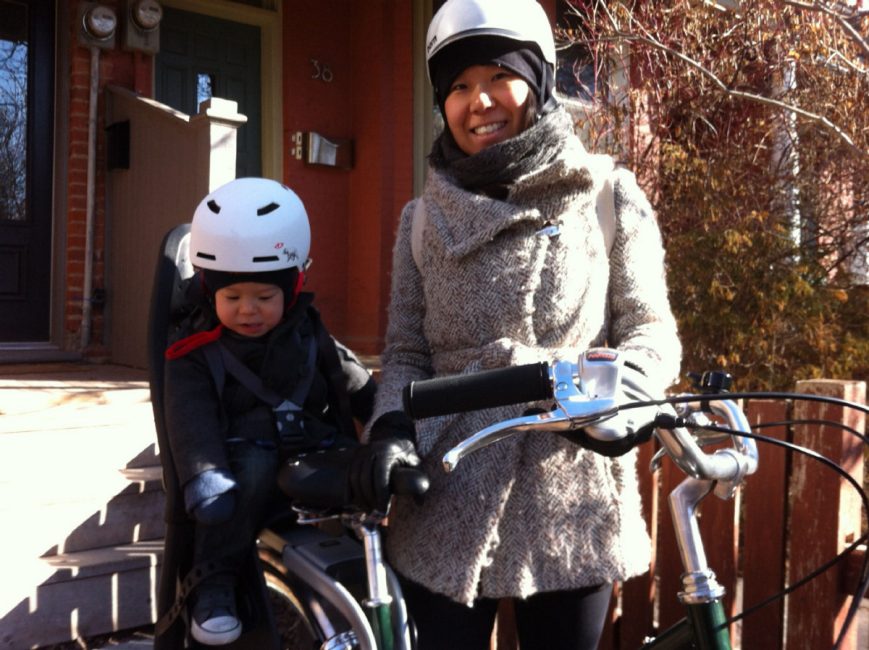 Dr. Sarah Kim, seen with her son, is a year round cyclist in Toronto, who is lucky to be alive after being knocked into traffic when a car door opened in front of her.&nbsp;&nbsp;(SARAH KIM PHOTO) &nbsp;