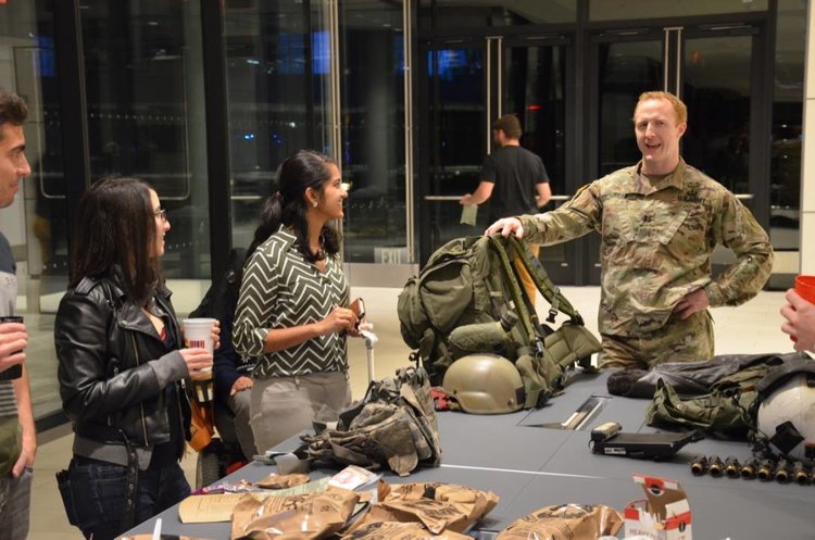 Demonstrating military gear &amp; taste testing MREs at the Veterans Day Closing Bell