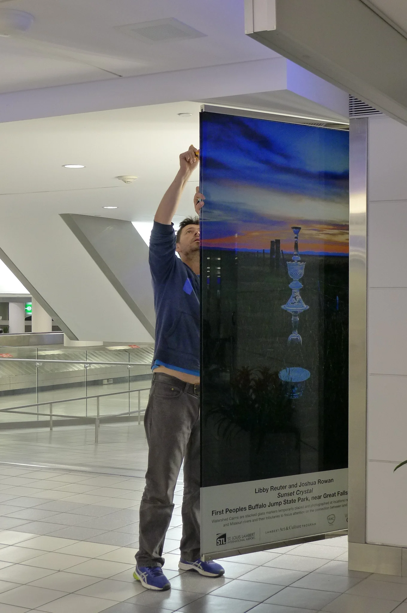 Installing Watershed Cairns images at St. Louis Lambert Airport