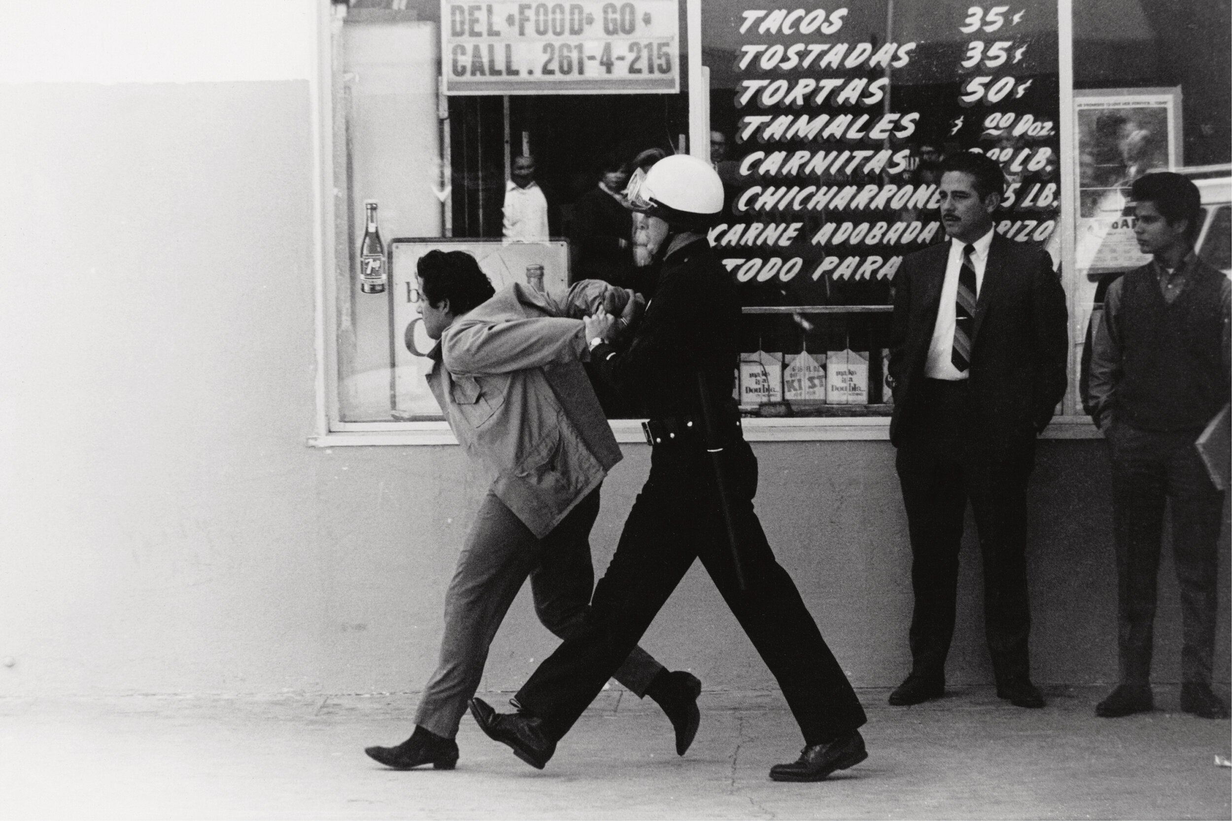 LAPD arresting protester, Boyle Heights, 1970