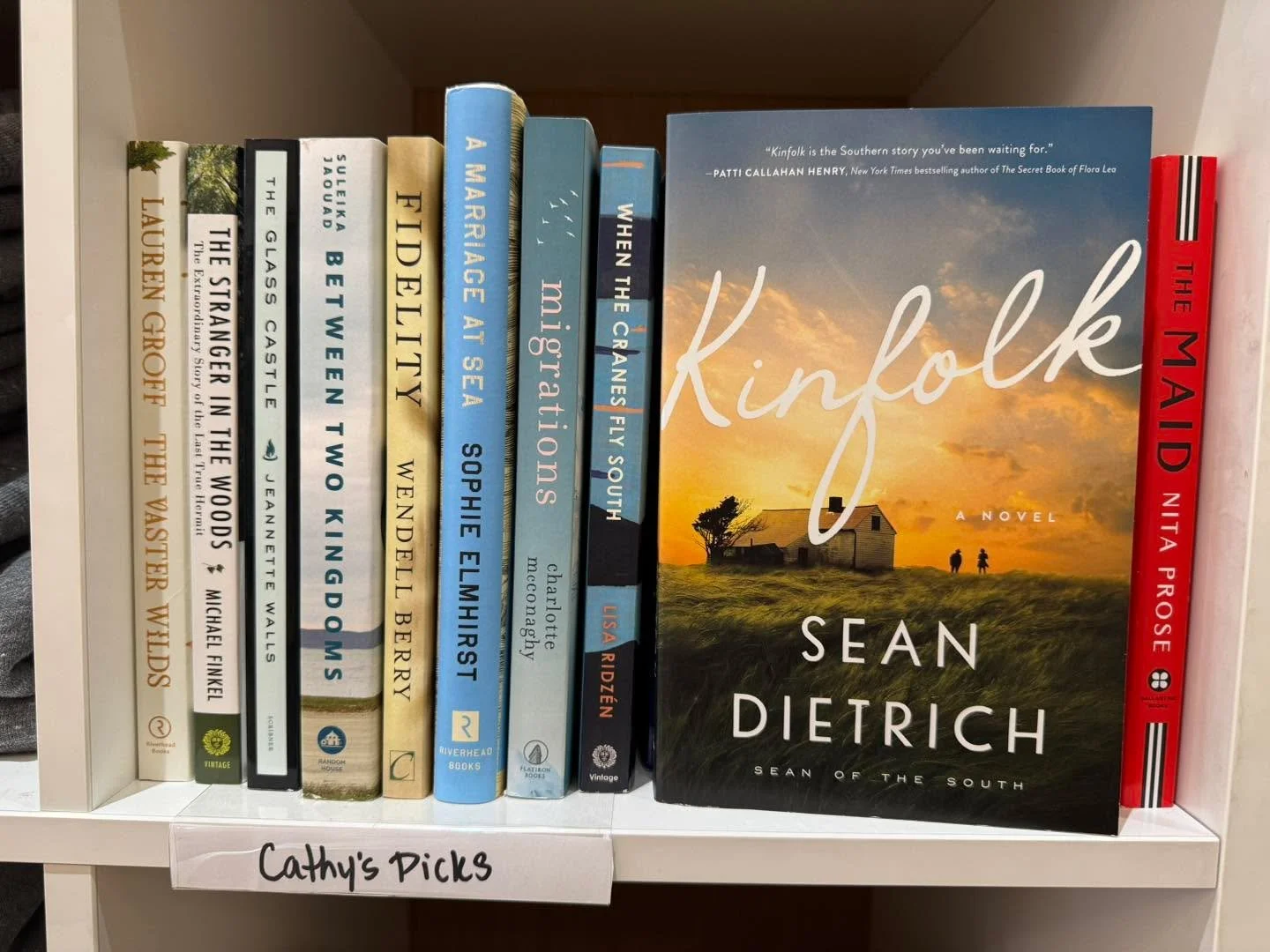 📚 Staff Picks Series:
Cathy reads a variety of books, but you can find a common thread on her shelf. The stories she chooses lean toward compassion, endurance, and humanity. Whether it&rsquo;s a quirky murder mystery, a heart-wrenching memoir, or a 