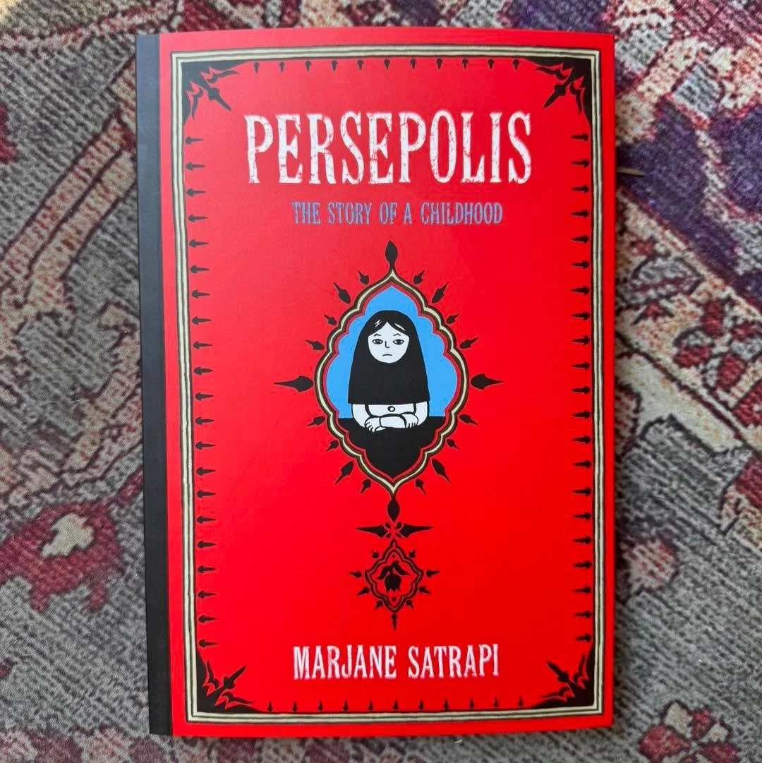 We are saddened to learn that Marjane Satrapi, the groundbreaking author of Persepolis, has died at the age of 56.

Through her unforgettable graphic memoir, she transformed personal history into a universal story of revolution, exile, and identity. 