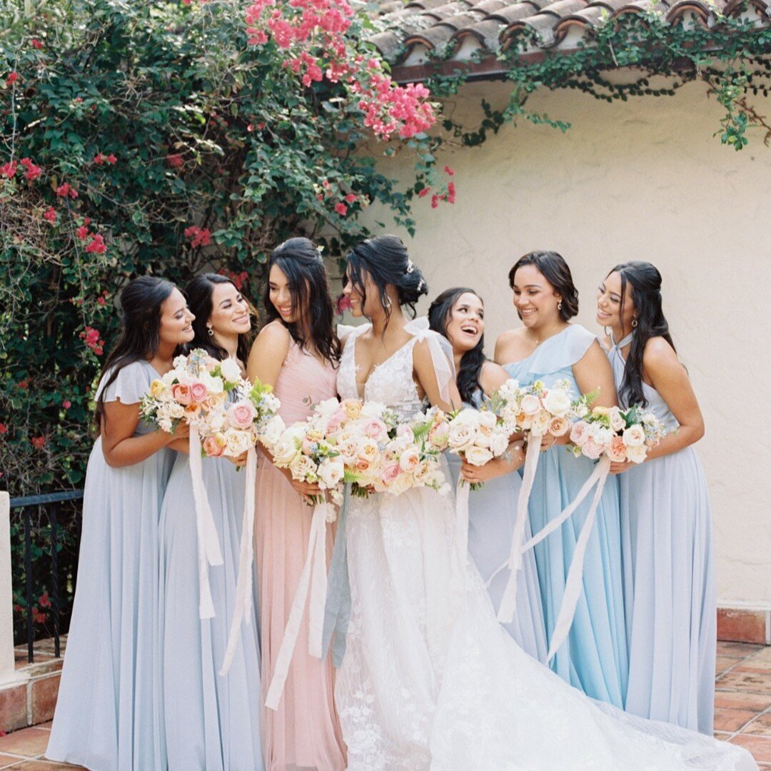 Hand dyed trailing silk ribbons add such visual impact to your wedding party florals. I'm not sure I'll ever tire from this trend.. 

Photo by @merariteruelphoto
Planning/Design by @claireduranweddingsandevents
Flowers by @bloom.52
Rentals by @elemen