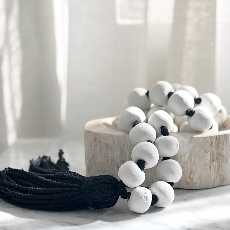 Clay beads black rope.jpg