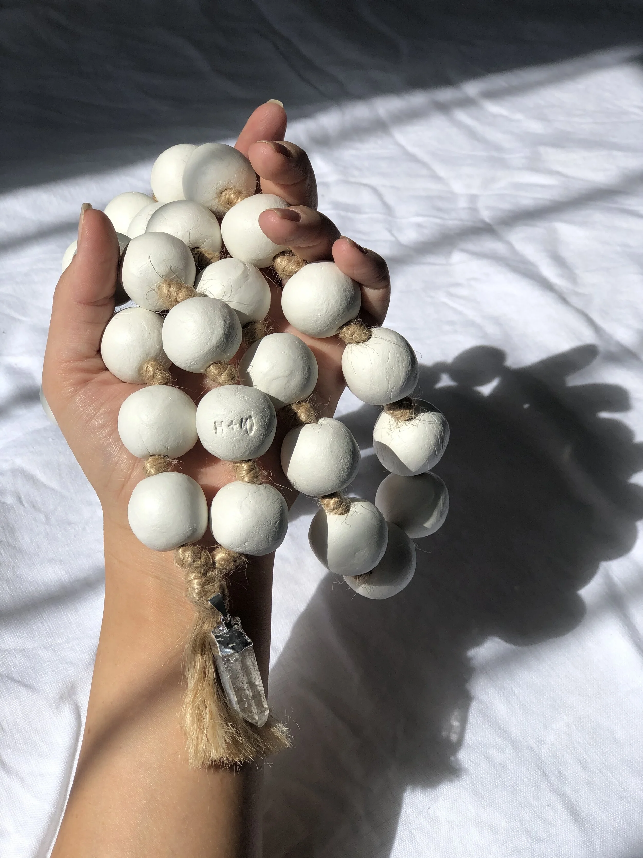 beads nat twine crystal hand.jpg
