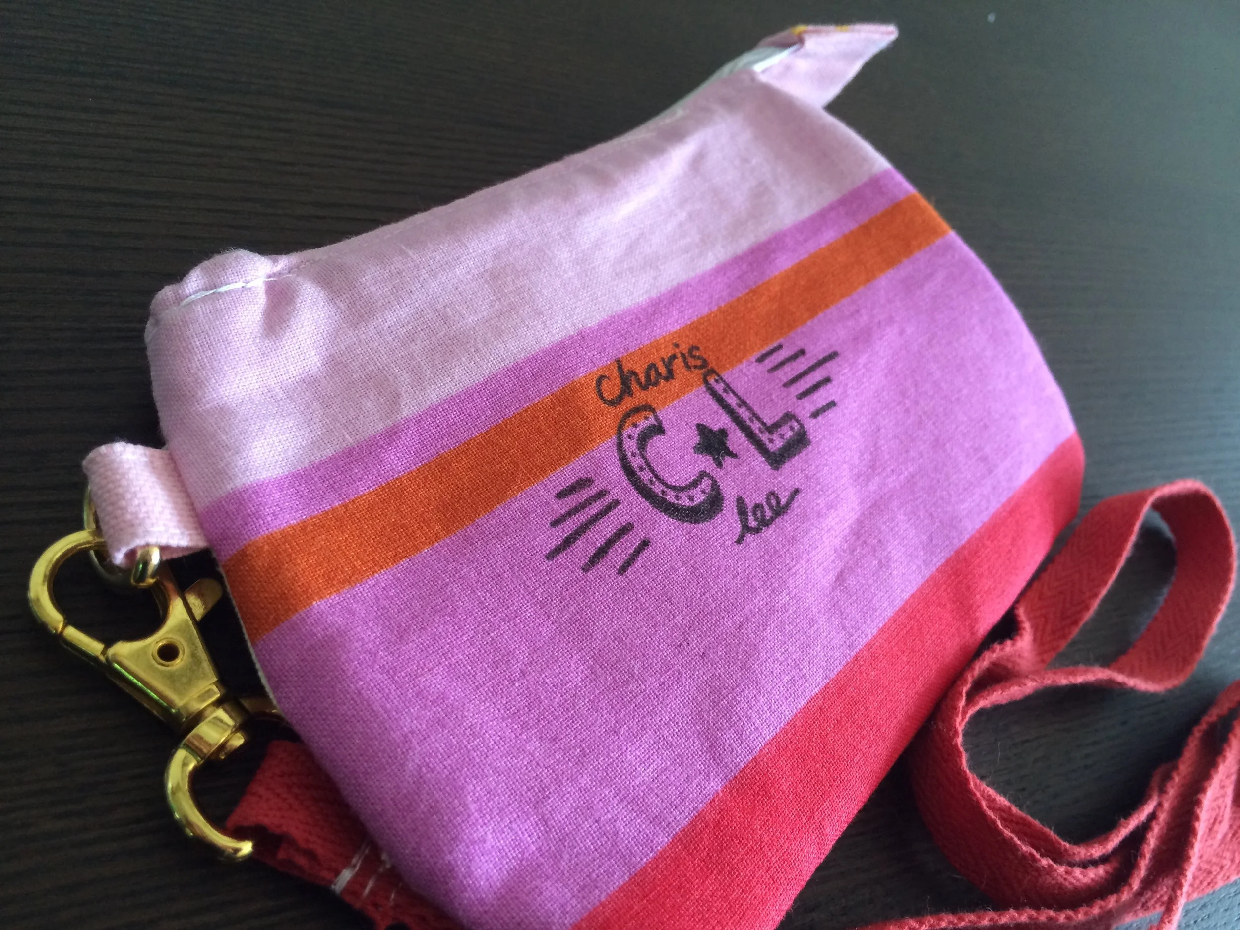 Hand-drawn letterings on the mini wallet
